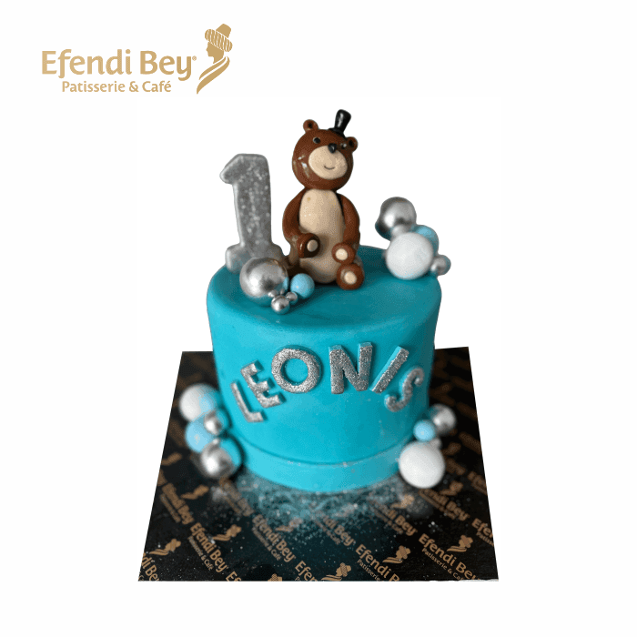 Blaue Fondanttorte mit Bärchen und Silberzahl 