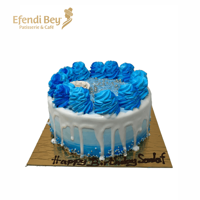 Blauer Dripcake mit Silberperlen